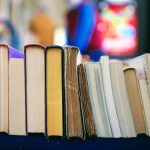 Library books stacked on end